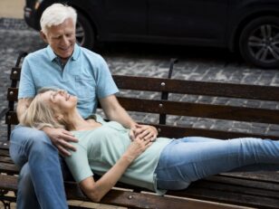 romantic-elder-couple-enjoying-their-time-bench-outdoors